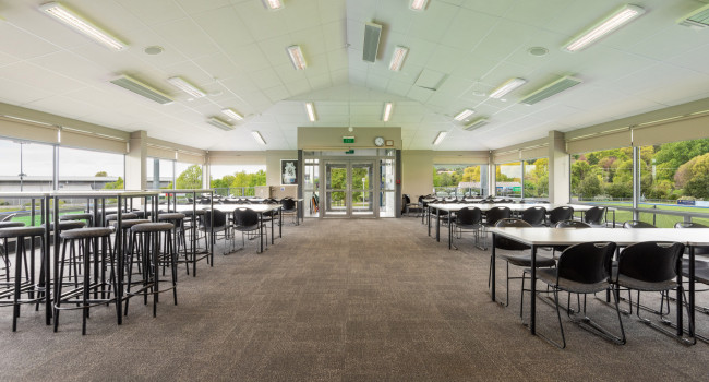 Saxton Hockey Clubroom empty room with tables and chairs