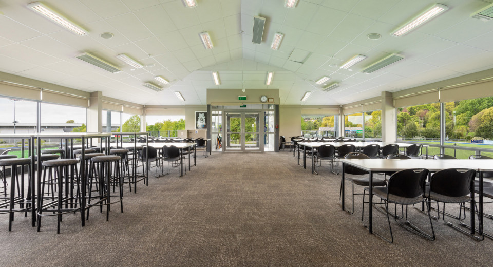 Saxton Hockey Clubroom empty room with tables and chairs